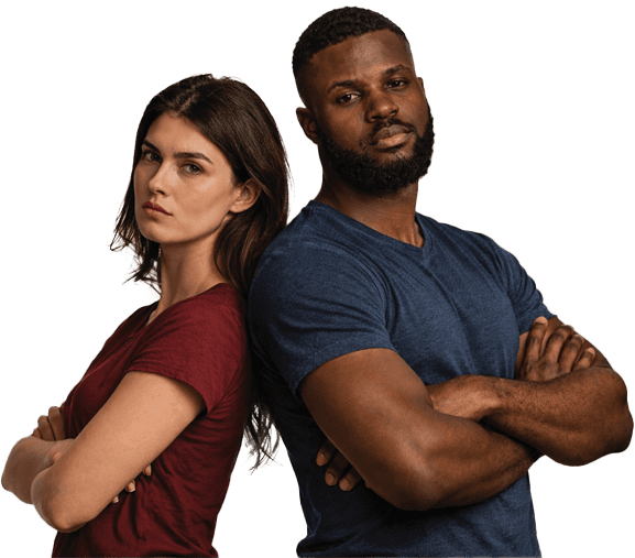 A man and woman standing back to back with arms folded, looking determined